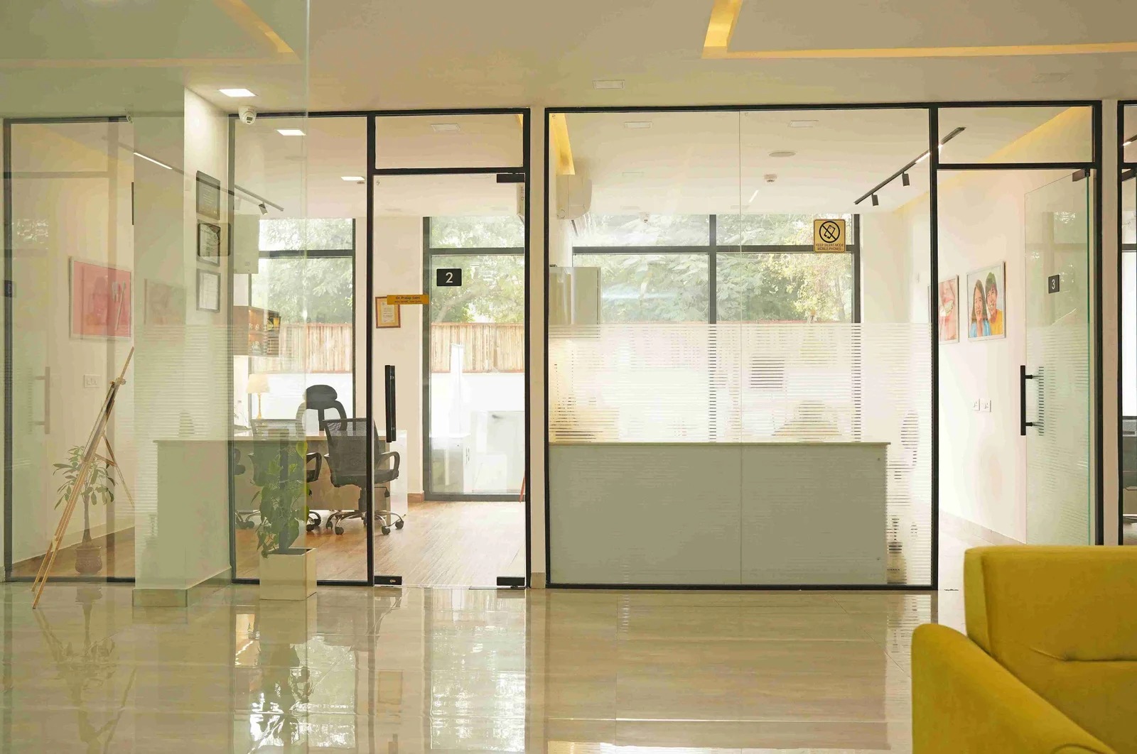 Clinic reception and glass-walled consultation rooms