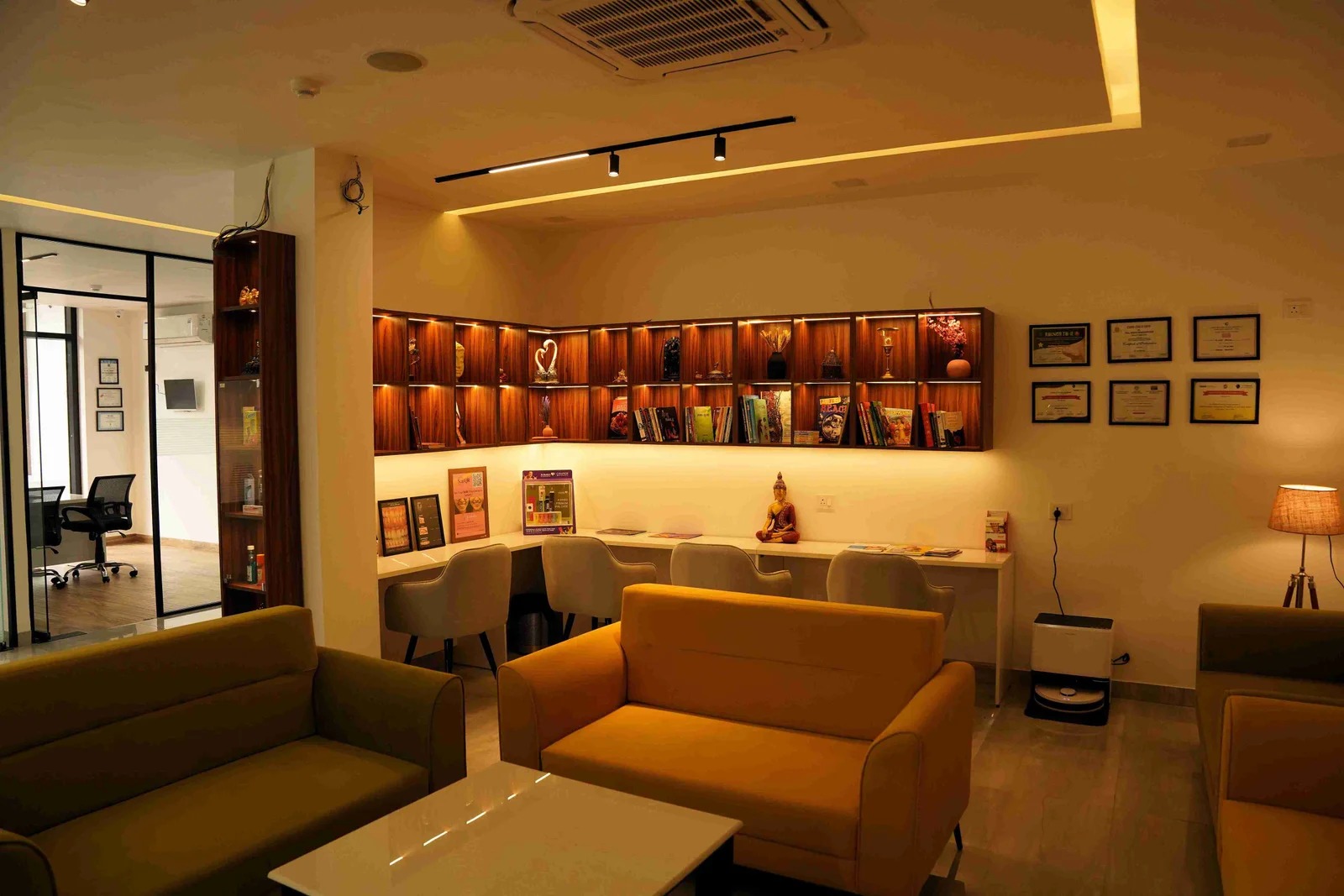 Patient lounge with accreditations on display